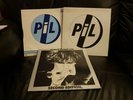 Pil vinyl records. First Edition album, Rise and This is not a love song.
