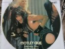 Motley Crue interview picture disc; limited edition  Stamped #1297 LP VINYL
