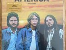 AMERICA Homecoming Limited Edition FLAMING GOLD COLORED VINYL #1561500 New