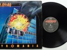 Def Leppard	Pyromania	422-810 308-1 M-1	US original LP mercury 1983 (107)