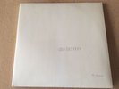 Beatles White Album Signed “To Edward Best Wishes George Martin”.