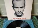 The The 'Mind Bomb' vinyl LP Epic/Some Bizzare (463319 1) UK 1989 +poster