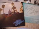 EAGLES hotel california, nm lp on ASYLUM, 1976, ORIGINAL INNER SLEEVE  + POSTER