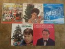 Five Vintage Christmas Vinyl Albums of popular artists from the time.
