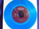 VERY Rare set of Beatles colored vinyl 45 RPM records Mint FACTORY SEALED