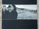 U2 - The Joshua Tree - 1987 LP 2 + Poster inner. Vinyl is in EX+ condition