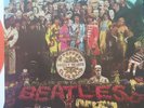 The Beatles. Sgt Pepper Lonely Hearts Club Band. Red Vinyl. Ex.