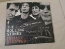 THE ROLLING STONES - totally stripped  très bon état.