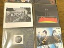U2 - Pac II 4x45 (Exclusive to Ireland) w/sleeves, plastic holder, 8 pins VG+