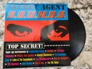 Secret Agent Sounds surf comp LP Man Or Astroman Deadbolt Los Straightjackets