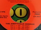7-Radio Spots: The Amityville horror original AIP 45 RPM record two-sided