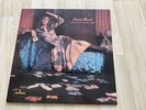 VINYL RECORD- DAVID BOWIE- THE MAN WHO SOLD THE WORLD ON GREYMARBLE EFFECT VINYL