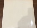 Beatles White album top loading numbered Embossed Beatles. ￼