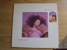 Kate Bush Hounds of Love Vinyl LP, includes Running up that Hill, and sticker