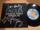the EAGLES autograph vinyl HEARTACHE TONIGHT don henley & glenn frey signed live