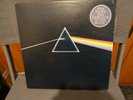 pink floyd dark side of the moon lp with both posters and stickers