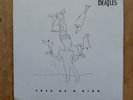 BEATLES FREE AS A BIRD ON VINYL IN EXCELLENT CONDITION 45 RPM .