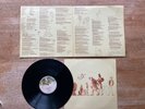 Genesis A Trick Of The Tail LP Nr Mint UK Vinyl The Famous Christmas Label