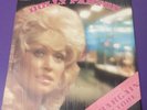 APL1-0950 The Bargain Store by Dolly Parton in Shrink Very Well Kept