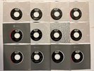 BEATLES SET OF 12 STORE STOCK STARLINE & RAINBOW CAPITOL LABEL 45s  1983  NM