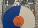 The Clash WHITE RIOT PROTEX BLUE WHITE SPLIT COLOUR VINYL LP No. 588 Near Mint