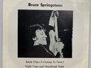 BRUCE SPRINGSTEEN: Santa Claus / Night Train / Heartbreak Hotel RED VINYL 7”M