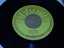 45RPM,  EDWIN BRUCE.  EIGHT WHEELS /  DOLL BABY.  NM-  RE -SSUE.