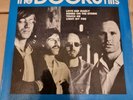 The Doors. Hits. Love her Madly. 7 Inch EP. Record Vinyl.  EX