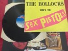 Sex Pistols Never Mind The Bollocks 1978 + Poster  and Badge .