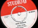 Delroy Wilson - Never Conquer / Run For Your Life (7