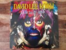 David Lee Roth.  Eat 'Em & Smile.  Signed by Roth & Vai.  1988. Vinyl LP