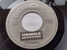 CANADA  NM- TRAVELING WILBURYS Handle With Care 1988 GREY LABEL 45 G. Harrison