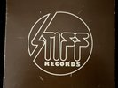 STIFF RECORDS 45 BOX SET-8000-UK 1979-VINYL MINT, NEVER PLAYED