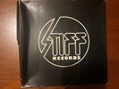 STIFF RECORDS SINGLES BOX - 1st edition: insert, records mint, box 45 years old