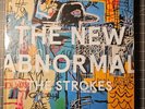 The Strokes - The New Abnormal Deluxe Photo Book and White Color Vinyl LP