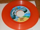 45RPM.  MANNED MERCURY SPACECRAFT /  MERCURY COMMUNICATIONS. ORANGE VINYL. VG+.