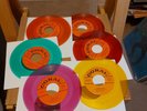 BUDDY HOLLY.PEGGY SUE/IT DOESN'T/TRUE LOVE.COLOURED VINYL.ORANGE CORAL LABEL.