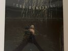 MOVEMENTS FEEL SOMETHING TRANSLUCENT BLOODSHOT VINYL IN HAND SHIPS FAST