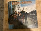 (Pronounced 'Leh-Nerd Skin-Nerd') by Lynyrd Skynyrd