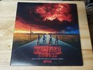 STRANGER THINGS MUSIC FROM THE NETFLIX ORIGINAL SERIES 2 LP'S CLEAR VINYL SWIRL.