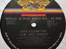 Love Committee - Law And Order / Just As Long As I Got You (12