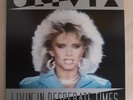Olivia Newton-John Livin' In Desperate Times / Twist Of Fate 1984 MCA-13987 EX