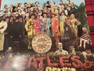 The Beatles “Sgt Peppers Lonely Hearts Club Band” LP Vinyl Record