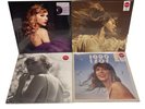 Taylor Swift Vinyl Records. Brand New. Fearless, 1989, Speak Now, Folklore.  Lot