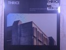 Thrice - Artist In The Ambulance Revisited - Clear Color Vinyl LP Record In Hand