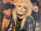 Two Steps From The Move by Hanoi Rocks (LP, 1984, Epic, 39614) Near Mint NM