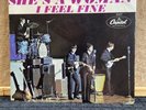 The Beatles 45rpm She's A Woman/I Feel Fine with picture sleeve/ Capitol 5327