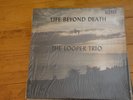 THE LOOPER TRIO 