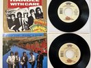 TRAVELING WILBURYS NEAR MINT 45s & SLEEVES. HANDLE WITH CARE  END OF THE LINE