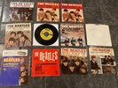 Vintage Beatles 45s and picture sleeves